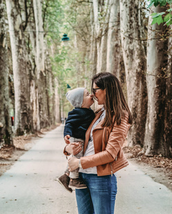 cute baby and mom in park