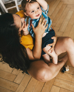 mom playing with baby 